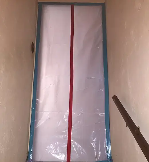 Mold remediation containment with a zippered entry