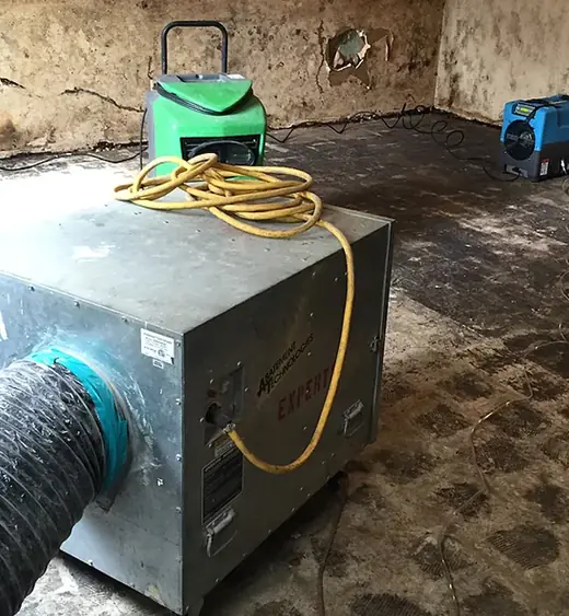 Air scrubber filtering a contained work area