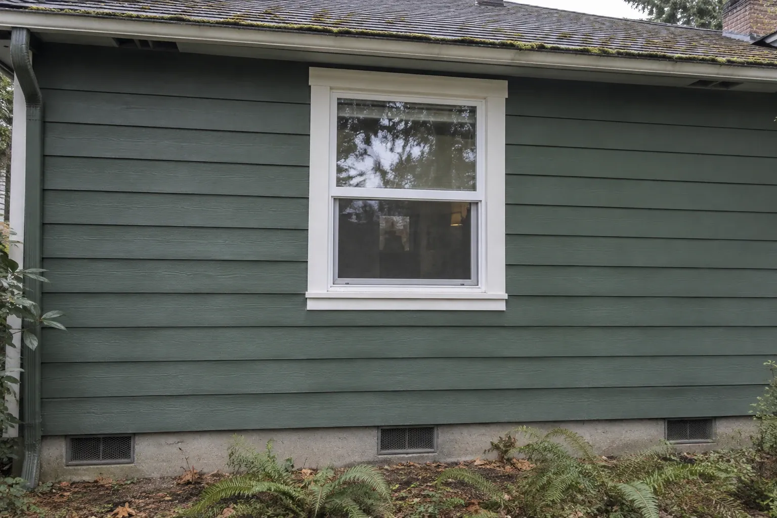 After: The wall is restored to a clean, sealed condition with no visible gaps or holes; the insulation job is complete and the repairs blend seamlessly with the original siding.