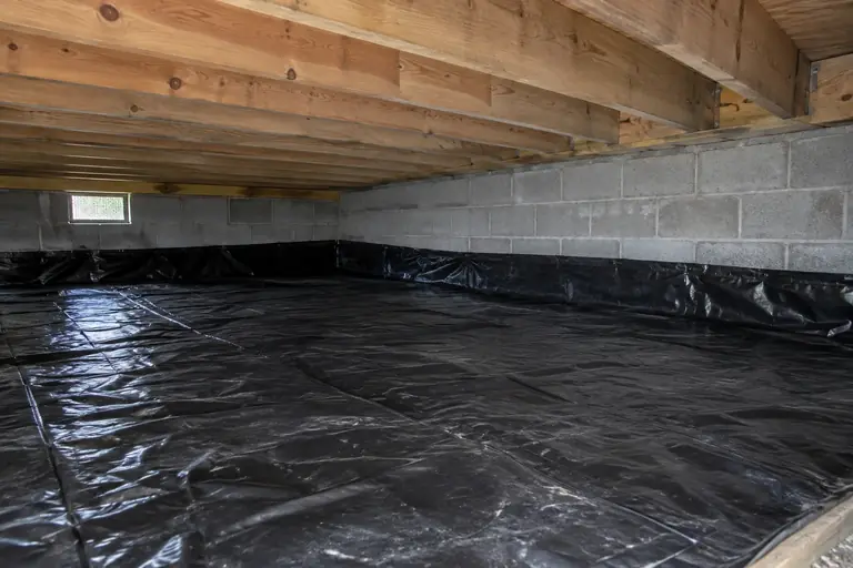 Mold remediation in Lakewood crawl space, after: Mold completely removed, and a new vapor barrier installed, leaving this Lakewood crawl space clean, dry, and well protected.